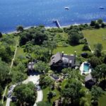 KNOWN AS Daybreak, the home sits on 5.8 acres of land along the East Passage of Narragansett Bay. Built in 2004, the mansion includes five bedrooms, six full baths, one lavette, a gourmet kitchen and a billiard room.  / COURTESY LILA DELMAN