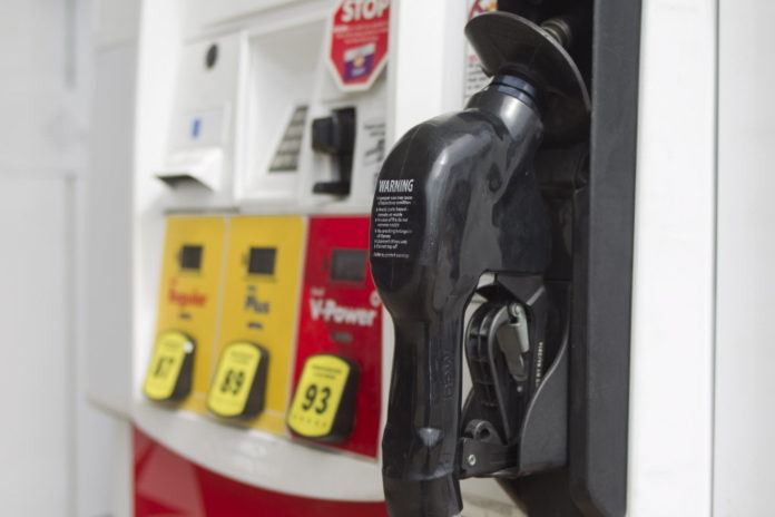 GAS PRICES dropped 4 cents in Rhode Island and Massachusetts, according to AAA Southern New England on Tuesday. / BLOOMBERG NEWS FILE PHOTO/ANDREW HARRER
