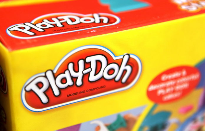 HASBRO Inc.'s Play-Doh logo is seen on an item for sale at a Target Corp. store in Rosemont, Ill. / BLOOMBERG NEWS TIM BOYLE HASBRO Inc.'s Play-Doh logo is seen on an item for sale at a Target Corp. store in Rosemont, Ill. / BLOOMBERG NEWS TIM BOYLE