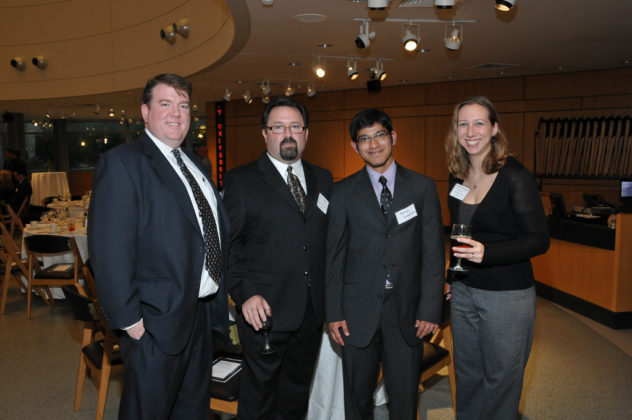 Kris Sullivan, Cary Collins, and Aditya Dhandmania, of Bryant University, with Nicole Mongillo from KVH Industries, the honoree of the Innovation of the Year for Information Technology  / Mike Skorski