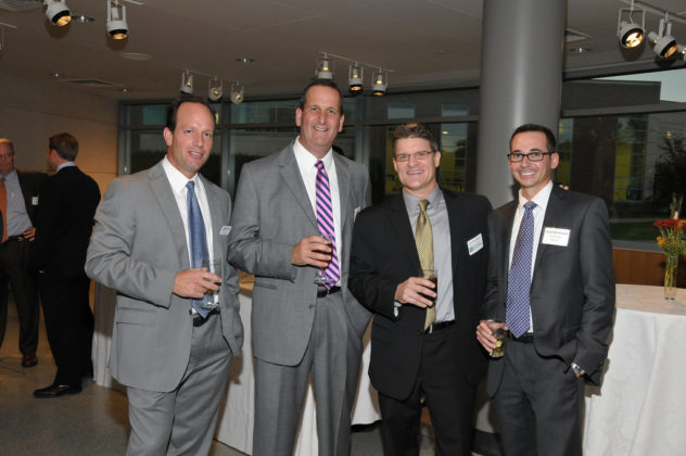 Brian Rossi and Robert Nagle from Gencorp, Jim Hanrahan from PBN, and Chad Bjorklund, also from Gencorp. Gencorp was a sponsor of the 2011 Innovation Awards. / Mike Skorski