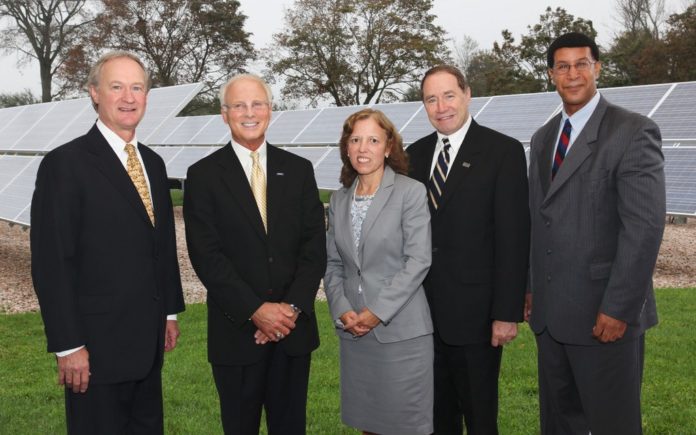 AMONG the guests joining Rick Schloesser, president and CEO of Toray Plastics (America) (second from left) at the inauguration of Toray's new solar farm at its North Kingstown plant were (left to right): Gov. Lincoln D. Chafee; M. Teresa Paiva Weed, Senate president; David M. Dooley, president of the University of Rhode Island; and Keith W. Stokes, Executive Director of the R.I. Economic Development Corporation. / COURTESY BUSINESS WIRE