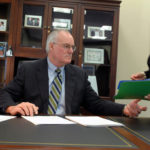 For MarcAurele, part of leading is giving back LEADING BY EXAMPLE: Joseph MarcAurele, CEO of The Washington Trust Co., in his office at 10 Weybosset St., with his executive secretary Maria N. Savella. / PBN PHOTO/BRIAN MCDONALD