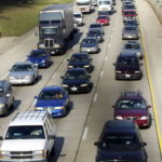 Traffic is backed up on a highway in Chicago, a scene expected to be repeated this Thanksgiving holiday. / BLOOMBERG NEWS FILE PHOTO/TANNEN MAURY
