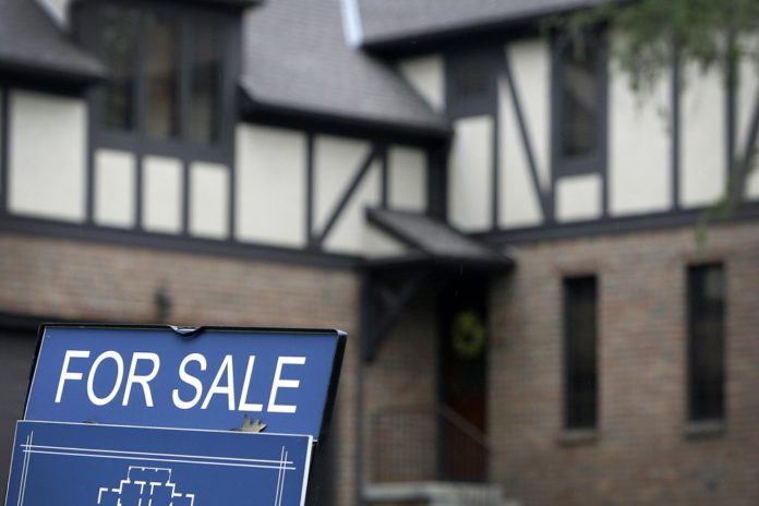 SINGLE-family home prices in Rhode Island dropped 6.9 percent in October compared with the same period last year, the sixth highest price decline of any state, CoreLogic said Tuesday. / BLOOMBERG NEWS FILE PHOTO JAY LAPRETE