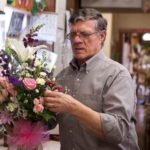 THORNY ISSUE: Allan Gilmore, owner of Gilmore's Flower Shop, said that many business in East Providence are displeased with the city's treatment of its commercial tenants. / PBN PHOTO/DAVID LEVESQUE