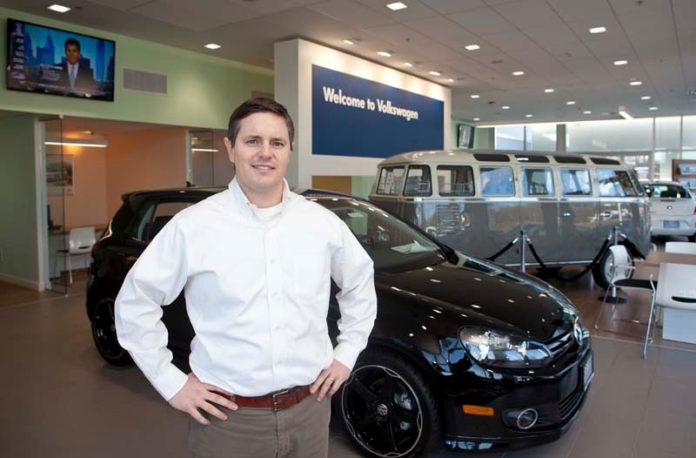 BRAND NEW LOOK: C. Bradford Scott, general manager of Scott Volkswagen in East Providence, in the new Taunton Avenue showroom. / PBN FILE PHOTO/DAVID LEVESQUE