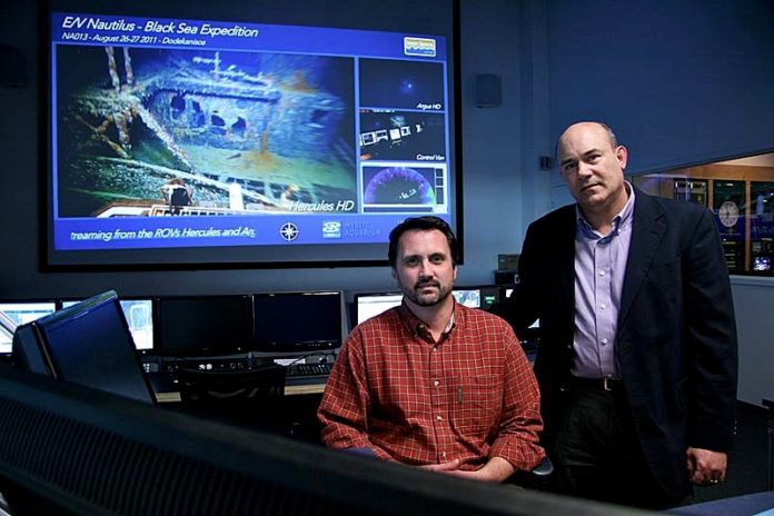 LEAGUES DEEP: URI oceanography professor Dwight Coleman, left, and RITE-Solutions Program Manager Jay Ferguson, in the school’s Inner Space Center. / PBN PHOTO/MICHAEL PERSSON