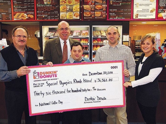 FROM LEFT: Joe Dutra, Dunkin’ Donuts franchisee; Dennis Delesus, CEO of Special Olympics Rhode Island; Michael Lucca, Special Olympics Rhode Island athlete; Cliff Prazeres, Dunkin’ Donuts franchisee; and Molly Burt, assistant field-marketing manager at Dunkin’ Donuts, attended the presentation of $36,562.05 to Special Olympics Rhode Island.