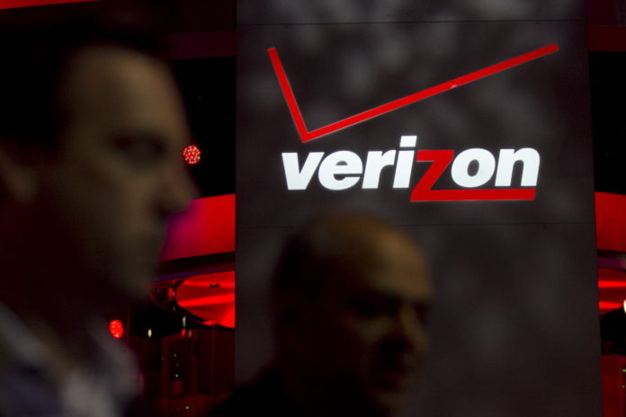 AT&T Inc. and Verizon Wireless moved a step closer to obtaining additional airwaves needed to meet surging consumer demand for smartphones as U.S. lawmakers agreed on a measure that authorizes sales of wireless spectrum. / BLOOMBERG NEWS FILE PHOTO ANDREW HARRER