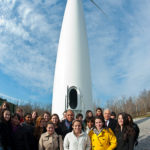 BLOWING IN THE WIND: The Durfee High School Green team, with Gov. Deval L. Patrick and Philips Lighting CEO Zia Eftekhar, at a ceremony marking the wind turbine's use last month.  / COURTESY MASSACHUSETTS OFFICE OF THE GOVERNOR