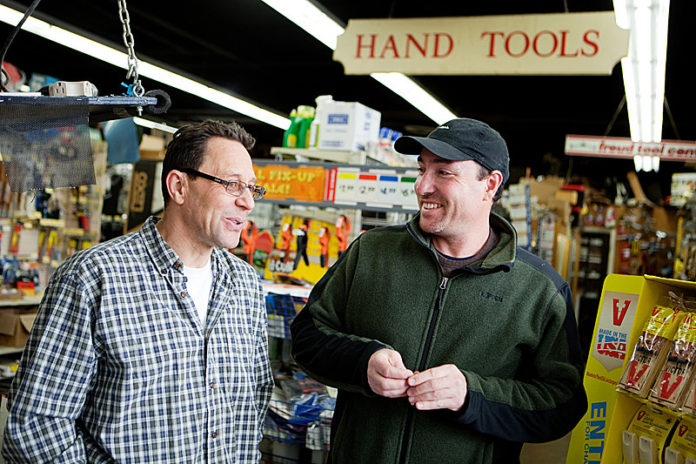 Since 1923 Mount Pleasant Hardware Inc. has flourished through good and bad economic times by following the same basic principles of fair pricing, quality service and knowledge of products. Owner Marc Gillson, above left, with customer Tom Coucci, knows his clients, Providence neighborhood and trade. The business, started by his grandfather, specializes in variety. It offers everything from electrical and lighting supplies and plumbing tools, to power tools, a garden shop and paint supplies. It also does extensive glass repairs. / PBN PHOTO/RUPERT WHITELEY