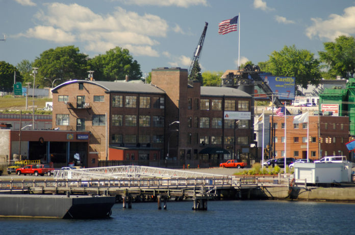 CONLEY'S PIER, a mixed-use development along Providence's Allens Avenue that included a 765-foot deep-water dock, has been purchased by National Grid, which intends to remediate the property before putting it to an unspecified use. / PBN FILE PHOTO/BRIAN MCDONALD