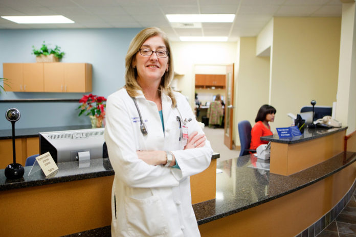 COLLABORATIVE EFFORT: Margaret "Peg" Miller is director of the Women's 
Medicine Collaborative, which now 
includes some 23 providers. / PBN PHOTO/RUPERT WHITELEY