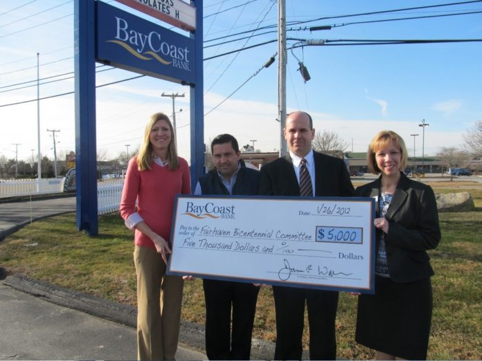 ANGELA DAWICKI of the Bicentennial Committee and Wayne Oliveira, Chairman of the Bicentennial Committee, receive a $5,000 check from BayCoast Bank Branch Manager Kevin Melo and Regional Branch Manager Paula Freitas. / COURTESY BANKFIVE