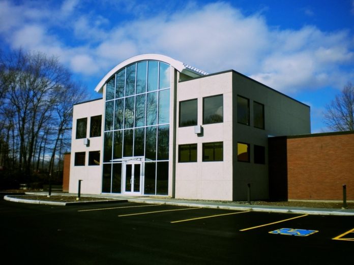 THANKS TO A $2 million investment, The Arpin Group's world headquarters in West Warwick now includes a solar power array, solar-reflective windows and workstations made from recycled materials, among other things. / COURTESY THE ARPIN GROUP THANKS TO A $2 million investment, The Arpin Group's world headquarters in West Warwick now includes a solar power array, solar-reflective windows and workstations made from recycled materials, among other things. / COURTESY THE ARPIN GROUP