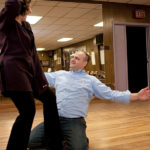 BRINGING IT HOME: Keith Lavimodiere of The Washington Trust Co. practices with dance instructor Deb O&rsquo;Donnell. He&rsquo;s one of seven &ldquo;celebrity&rdquo; dancers in an April 26 fundraiser for the Rhode Island Mentoring Partnership. / PBN FILE PHOTO/DAVID LEVESQUE