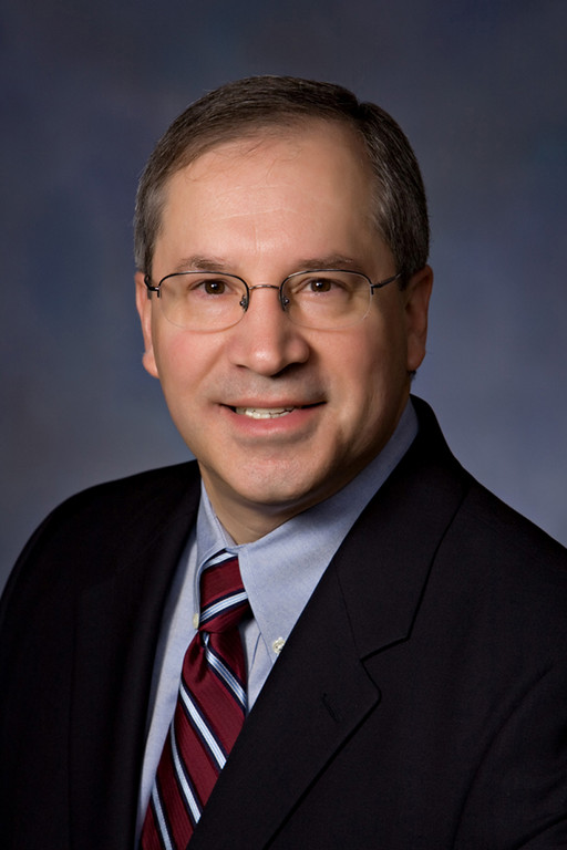 COUNTING ON HIM: David V. DeVault joined The Washington Trust Co. in 1986, becoming its chief financial officer a year later. A quarter-century later, he's still in the role. / PBN PHOTO/CATIA CUEN COUNTING ON HIM: David V. DeVault joined The Washington Trust Co. in 1986, becoming its chief financial officer a year later. A quarter-century later, he's still in the role. / PBN PHOTO/CATIA CUEN