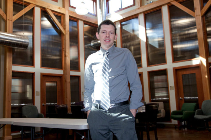 NO WINGS NEEDED: Lucas J. Lussier, chief financial officer and business manager at The Met, cites "It's a Wonderful Life" as one of his greatest inspirations. He incorporates the film's message of sacrifice into his work. / PBN PHOTOS/NATALJA KENT NO WINGS NEEDED: Lucas J. Lussier, chief financial officer and business manager at The Met, cites "It's a Wonderful Life" as one of his greatest inspirations. He incorporates the film's message of sacrifice into his work. / PBN PHOTOS/NATALJA KENT