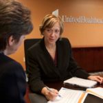 PROVIDING CARE: Lauren Conway, right, chief financial officer of UnitedHealthcare of New England, leads the budgeting of a company that reports more than $1.1 billion in local revenue. In her spare time, she volunteers for Big Sisters. / PBN PHOTO/CATIA CUEN