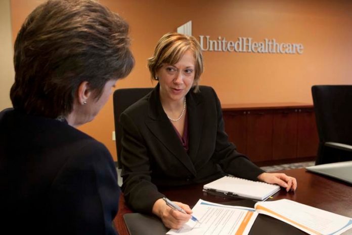 PROVIDING CARE: Lauren Conway, right, chief financial officer of UnitedHealthcare of New England, leads the budgeting of a company that reports more than $1.1 billion in local revenue. In her spare time, she volunteers for Big Sisters. / PBN PHOTO/CATIA CUEN