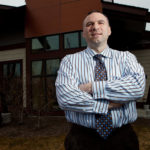 BUILDING SOMETHING: New England Construction Director of Finance Michael Alviano joined the company four years ago as an account manager. When the company lost its CFO soon after, Alviano assumed the responsibilities and, eventually, the position. / PBN PHOTO/RUPERT WHITELEY
