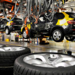 Industrial production in U.S. rises 1.1%, more than forecast A BMW X5 moves down an overhead conveyor at the company's BMW Manufacturing Co. plant in Spartanburg, South Carolina, U.S. / BLOOMBERG FILE PHOTO/MARK ELIAS