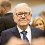 MEDIA GENERAL has signed an agreement with Berkshire Hathaway Inc. to sell the majority of its newspapers.  Warren Buffett, chairman of Berkshire Hathaway Inc., tours the vendor floor during the Berkshire Hathaway annual shareholders meeting in Omaha, Nebraska, U.S. / BLOOMBERG FILE PHOTO/DANIEL ACKER