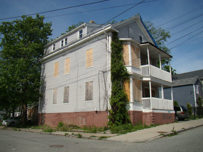 COURTESY PPS
A HOUSE IS NOT A HOME: The foreclosed house at 90 Pleasant St. is one of the 
multifamily units included in an entry on the PPS most-endangered-properties list.