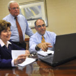 STAYING ON BOARD: Sullivan & Co. employees, from left: manager Jacqueline Waldon and principals Timothy J. Sullivan and Michael Hanna. / PBN PHOTO/FRANK MULLIN