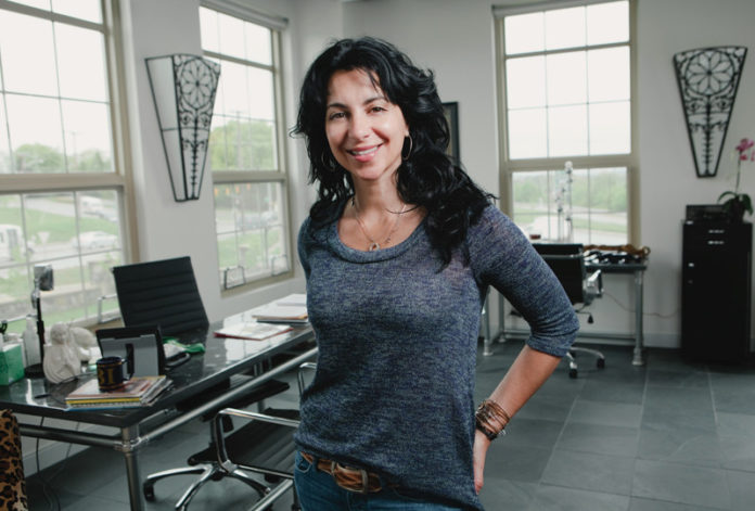 CAROLYN RAFAELIAN, owner and president of Alex and Ani, has been named the 2012 Ernst & Young Entrepreneur of the Year in the consumer products category in New England. / PBN FILE PHOTO/RUPERT WHITELEY