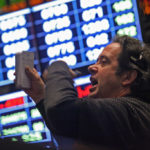 U.S. STOCKS fluctuated, after a four-day gain in the S&P 500 Index, ahead of a Federal Reserve decision on whether it will boost the economy. / BLOOMBERG FILE PHOTO/TIM BOYLE