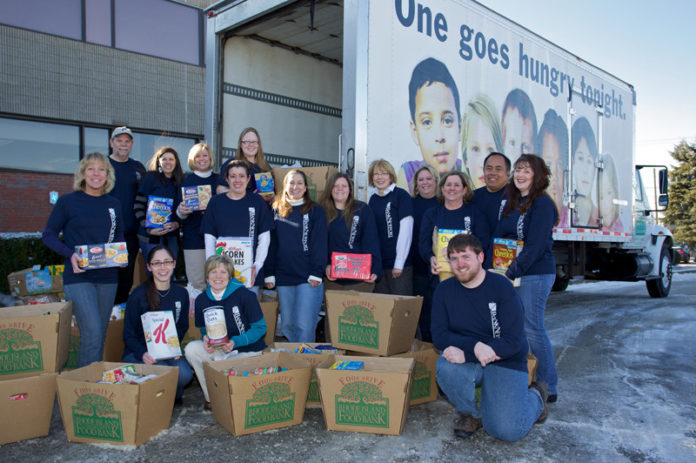 FEEDING A NEED: BankNewport’s employees pitched in to collect more than three-quarters-of-a-ton of food for the Rhode Island Community Food Bank over the winter. / Courtesy BankNewport