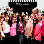 Going mobile adds
to designer’s appeal CONNECTION TO CAUSES: Alex and Ani donates 20 percent of sales from its Charity by Design collection to a charity. Staff gather at the company’s Cranston offices to mark fundraising for breast cancer. / Courtesy Alex And Ani