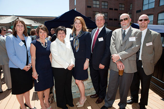 Honoree Carol DeNale (center) with her colleagues from CVS Caremark / Rupert Whiteley