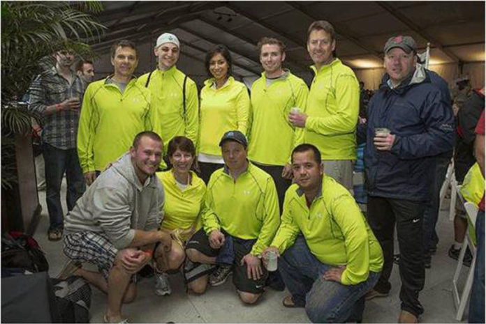 EMPLOYEES AT Independence Financial recently rode their bikes and ran, raising more than $15,000 for Best Buddies Rhode Island. From left to right, front row: Jim Falvey, Deb Nelson, Chris Beaulieu, Joshua Gorra; back row: Rick Beaulieu, John Carbone, Rulla Nehme, Brian Rys, Mike Harrington and Randal Poirier.