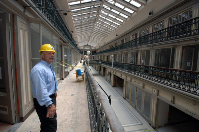 LIVING HISTORY: Evan Granoff, owner of The Arcade Providence, tours the nearly 200-year-old structure. Current renovations will create a mix of residential and commercial space in the building. / PBN PHOTO/BRIAN MCDONALD