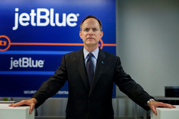 JETBLUE AIRWAYS President and CEO Dave Barger, joined Gov. Lincoln D. Chafee, Warwick Mayor Scott Avedisian and R.I. Airport Corporation board chair Dr. Kathleen C. Hittner, among others, on Wednesday to announce JetBlue service to T.F. Green Airport. / BLOOMBERG FILE PHOTO/VICTOR J. BLUE