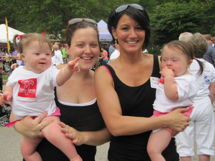 SUPPORTERS OF Easter Seals Rhode Island helped raise more than $50,000 for the organization during a recent 5K. Pictured (from left to right) are participants Celia with her mother, Katie Furtado, and Rachel Walsh with Valentina Lamperelli. / COURTESY EASTER SEALS SUPPORTERS OF Easter Seals Rhode Island helped raise more than $50,000 for the organization during a recent 5K. Pictured (from left to right) are participants Celia with her mother, Katie Furtado, and Rachel Walsh with Valentina Lamperelli. / COURTESY EASTER SEALS