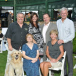 Winner Matt Dempsey, Site Specific (standing, second from right) surrounded by friends and family / Skorski Photography