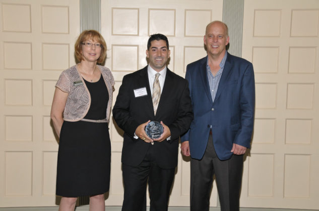 Michael Crawley, Audit Manager with LGC&amp;D accepts his award from Sandra Pattie, BankNewport and Roger Bergenheim, PBN / Skorski Photography