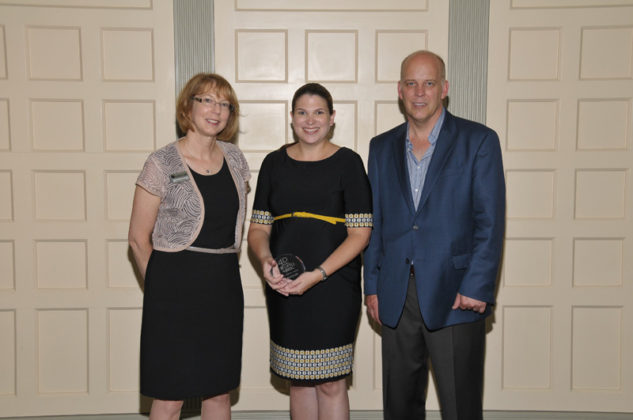 Honoree Jill Cormier,  GTECH, accepts her award from Sandra Pattie and Roger Bergenheim / Skorski Photography