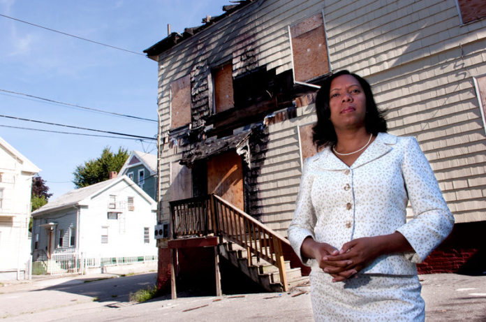 FINE LINE: Providence City Councilor Sabina Matos is co-sponsoring an ordinance that would fine property owners for leaving abandoned houses in poor condition. / PBN PHOTO/CHRIS SHORES