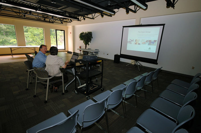 ADDING CAPACITY: Arpin Group has created a new space at its West Warwick headquarters that can be used for exercise classes as well as media presentations. / PBN PHOTO/BRIAN MCDONALD