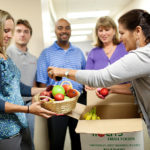 STANDING TALL: Carousel Industries provides fruit baskets for employees in various locations throughout the workplace, among other initiatives. / PBN PHOTO/RUPERT WHITELEY