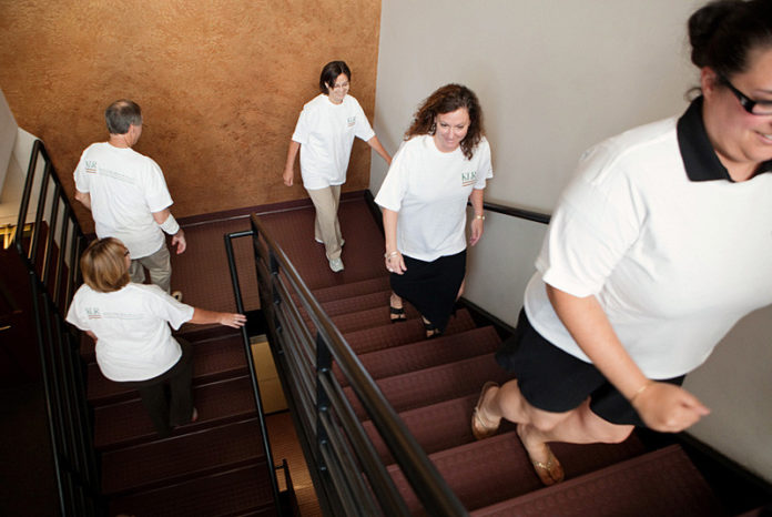 ALL TOGETHER NOW: Every day at Kahn, Litwin, Renza’s Providence headquarters, staff take a brisk walk, both inside and outside the building. / PBN PHOTO/
RUPERT WHITELEY ALL TOGETHER NOW: Every day at Kahn, Litwin, Renza’s Providence headquarters, staff take a brisk walk, both inside and outside the building. / PBN PHOTO/
RUPERT WHITELEY
