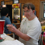Burlingame a jolt to summer economy HAPPY CAMPERS: Christopher Craig prices batteries at the Burlingame state park store. / PBN PHOTO/BRIAN MCDONALD