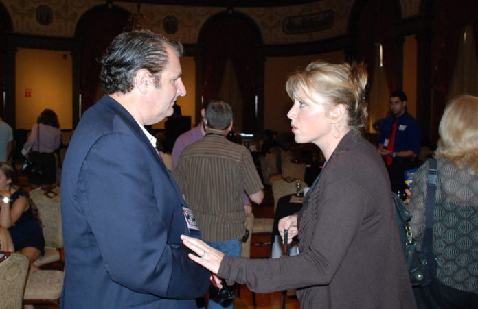 Steven Feinberg, executive director of the R.I. Film & TV Office, chats with filmmaker Amy Redford, daughter of actor and director Robert Redford, at the 2012 Rhode Island International Film Festival’s film forum at the Providence Biltmore Hotel on Aug. 9. Redford premiered her film “Delivery” at the festival, which this year attracted 176 filmmakers. Among the discussions at the forum was how to get more filmmakers to shoot movies in Rhode Island. / COURTESY RHODE ISLAND FILM & TV OFFICE