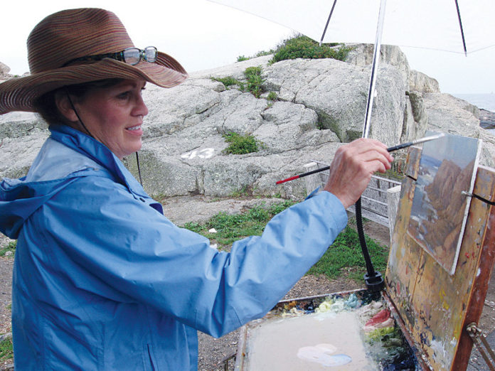 CINDY BARON, a local artist, paints a scene from the end of Ledge Road in Newport. Baron was one of more than 300 artists who participated in Newport Art Museum’s Wet Paint weekend, an annual fundraiser.