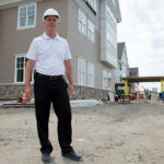 Making Tockwotton more like a home A PLACE TO CALL HOME: Kevin McKay, executive director of Tockwotten, in front of the $52.3 million project on Narragansett Bay. It's slated to open Dec. 15. / PBN PHOTO/NATALJA KENT